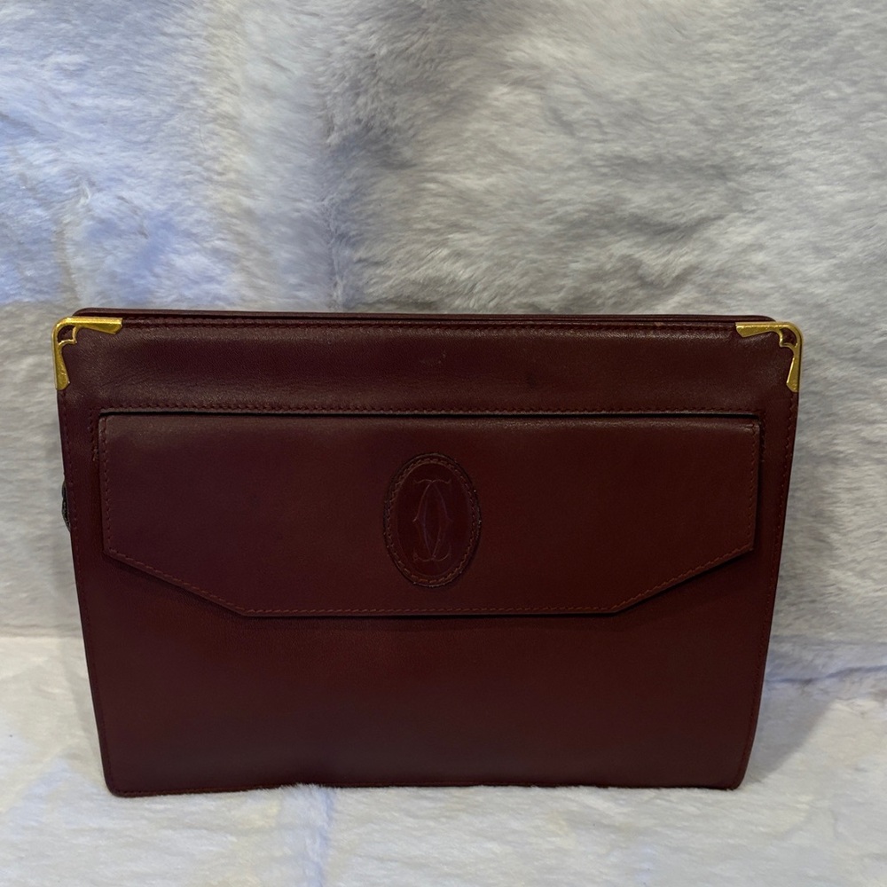 Cartier Burgundy Leather Clutch with Gold Accents